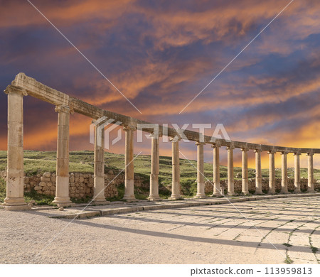 Forum (Oval Plaza) in Gerasa (Jerash), Jordan. Was built in the first century AD. Against the background of a beautiful sky with clouds. Forum (Oval Plaza) in Gerasa (Jerash), Jordan. Was built in the first century AD. Against the background of a beautiful sky with clouds. 113959813
