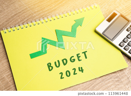 Notebook 2024 and up arrow. Growth and development of business and economy. Investments, financial fund. Business analysis. 113961448