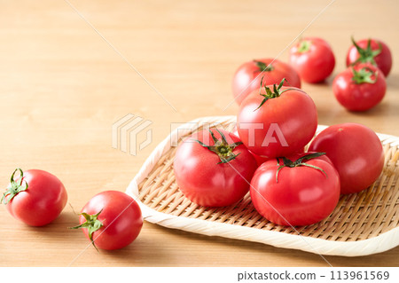 Tomatoes in a colander 113961569