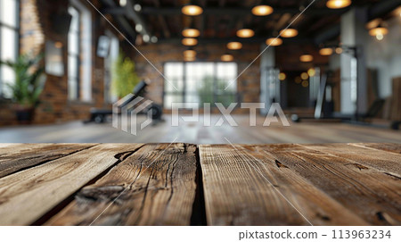 closeup wood table with blur gym. copyspace for product 113963234