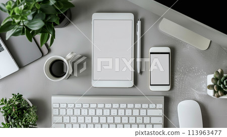 Blank screen tablet and keyboard on table in meeting room of office workspace. Top view. Blank screen tablet and keyboard on table in meeting room of office workspace. Top view. 113963477