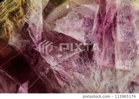 Macro stone mineral Fluorite on a black background 113965174