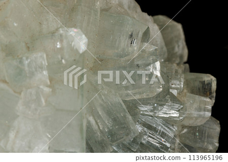 Macro stone Apophyllite mineral on black background 113965196