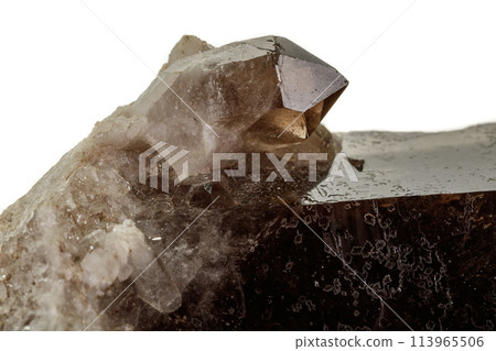 Macro mineral stone smoky quartz, rauchtopaz on a white background 113965506