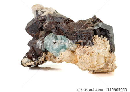 Macro tourmaline mineral stone on white background Macro tourmaline mineral stone on white background 113965653