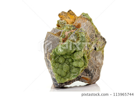 Macro pink Smithsonite mineral stone on microcline on white background Macro pink Smithsonite mineral stone on microcline on white background 113965744