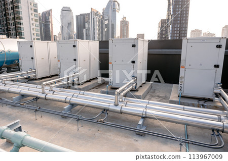 Heat pump Compressor hot water supply by heat exhanger to heating water for hotel or large commercial building roof top outdoor installation. 113967009