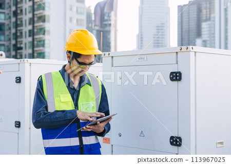 engineer male technician worker working service commercial building heat pump hot water supply systems. man safety checking maintenance heating water machine at roof top outdoor. 113967025
