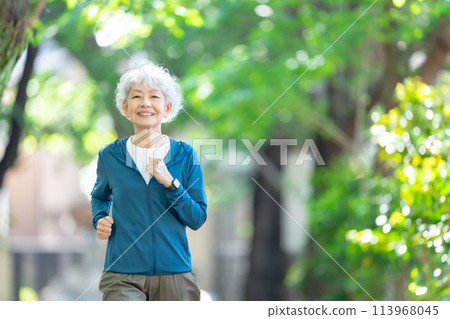 Fresh greenery running senior woman Fresh greenery running senior woman 113968045