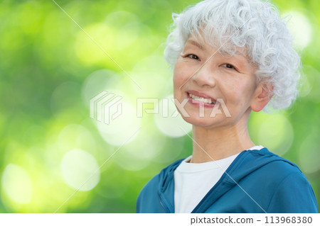 Senior woman in sportswear, fresh greenery Senior woman in sportswear, fresh greenery 113968380