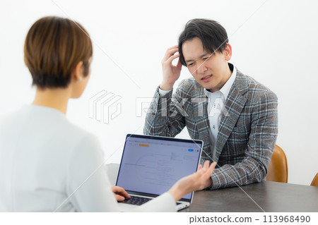 Man consulting with consultant Man consulting with consultant 113968490