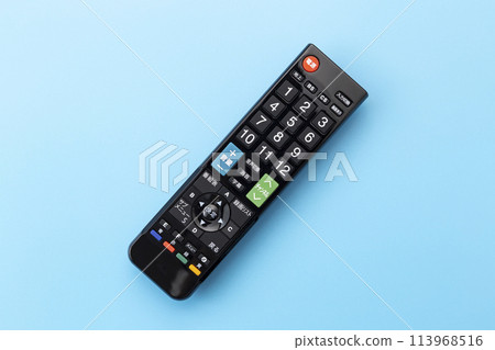 TV remote control on a blue background TV remote control on a blue background 113968516