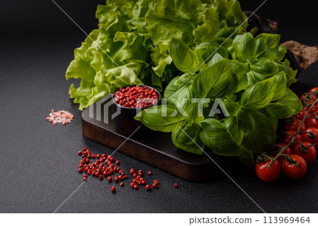 Fresh herbs basil in the form of a bush as an ingredient for cooking at home 113969464