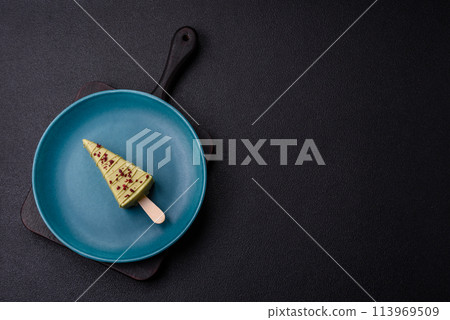 Delicious sweet cheesecake with fruits covered with icing 113969509