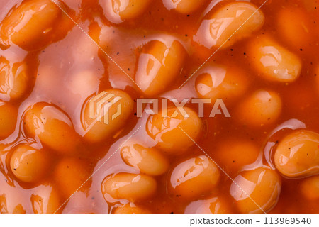 Delicious nutritious canned beans in tomato, with salt and spices 113969540