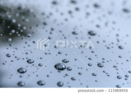 Raindrops on the surface of the car glass. Raindrops natural abstract background.1 Raindrops on the surface of the car glass. Raindrops natural abstract background.1 113969956