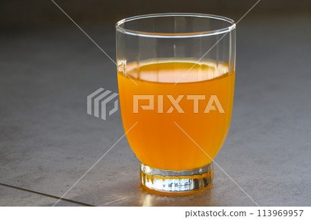 fresh tangerine lemonade on stone surface 1 113969957