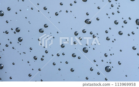 Close-up of wet windshield during rainy season 1 Close-up of wet windshield during rainy season 1 113969958