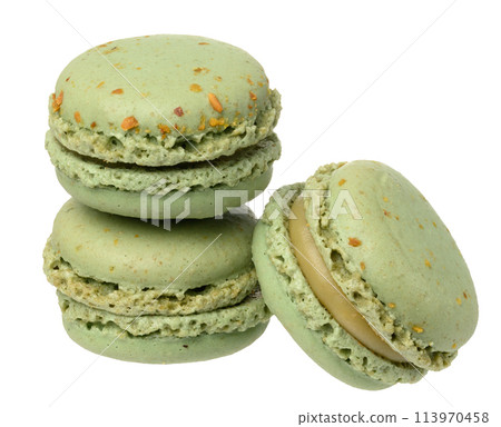 Stack of pistachio macarons on isolated background 113970458