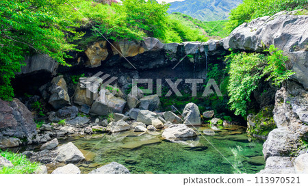 Scenery of the Sensuikyo gorge with the clear green mountains in the background "Miyamakirishima (Sensuikyo)" Aso City 113970521