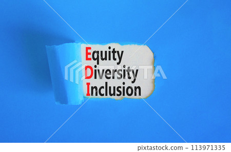 EDI equity diversity inclusion symbol. Concept words EDI equity diversity inclusion on white paper on beautiful blue background. Business EDI equity diversity inclusion concept. Copy space. 113971335