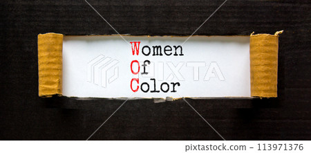 WOC women of color symbol. Concept words WOC women of color on beautiful white paper. Beautiful black paper background. Business WOC women of color social issues concept. Copy space. 113971376