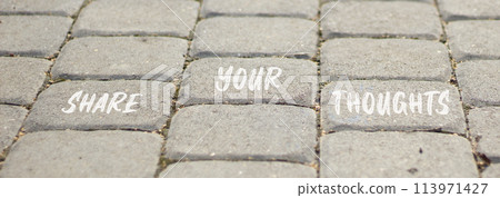 Share your thoughts symbol. Concept words Share your thoughts on beautiful grey paving slabs. Beautiful grey paving slabs background. Business share your thoughts concept. Copy space. Share your thoughts symbol. Concept words Share your thoughts on beautiful grey paving slabs. Beautiful grey paving slabs background. Business share your thoughts concept. Copy space. 113971427