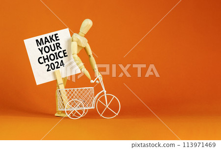 Make your choice 2024 symbol. Concept words Make your choice 2024 on beautiful white paper on clothespin. Bicycle model. Beautiful orange background. Business Make your choice 2024 concept. Copy space Make your choice 2024 symbol. Concept words Make your choice 2024 on beautiful white paper on clothespin. Bicycle model. Beautiful orange background. Business Make your choice 2024 concept. Copy space 113971469