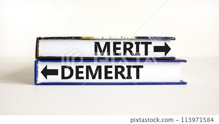 Demerit or merit symbol. Concept word Demerit or Merit on beautiful books. Beautiful white table white background. Business and demerit or merit concept. Copy space. Demerit or merit symbol. Concept word Demerit or Merit on beautiful books. Beautiful white table white background. Business and demerit or merit concept. Copy space. 113971584