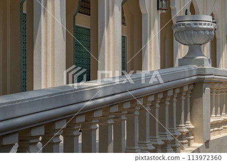 Baroque architecture details of Bang O Mosque with Stone railings or Balustrades and Roman style ornamental flower pot with Sunlight shine through the wall. 113972360