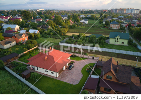 Aerial view of residential houses in suburban rural area 113972809