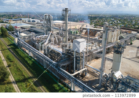 Aerial view of factory with high plant manufacture structure. Global production and manufacturing concept. 113972899