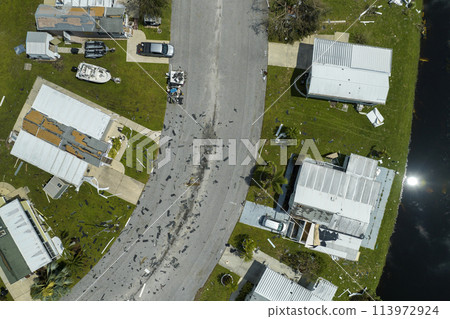 Destroyed by hurricane Ian suburban houses in Florida mobile home residential area. Consequences of natural disaster Destroyed by hurricane Ian suburban houses in Florida mobile home residential area. Consequences of natural disaster 113972924