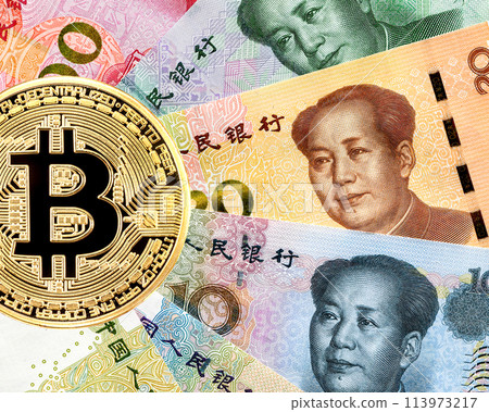 Bitcoin cryptocurrency and banknotes of Chinese money with portrait of Mao Zedong Bitcoin cryptocurrency and banknotes of Chinese money with portrait of Mao Zedong 113973217