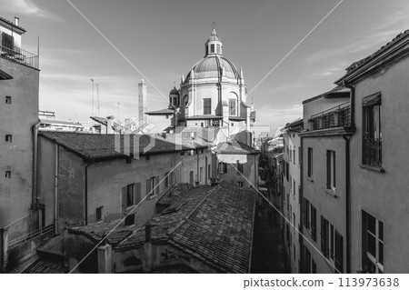 This black and white image captures a timeless scene over Bologna Via Pescherie Vecchie 113973638