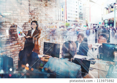 Business people in office work together during a meeting Business people in office work together during a meeting 113975892