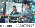 Businessman works on trading stock market chart on a computer 113975937