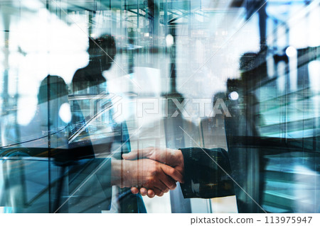 Handshaking of business people in office as concept of teamwork and partnership Handshaking of business people in office as concept of teamwork and partnership 113975947