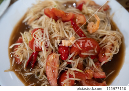 Som Tum, Thai papaya salad served on plate. Som Tum, Thai papaya salad served on plate. 113977138