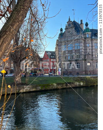 Canals of Strasbourg, Alsace, France in a beautiful spring day Canals of Strasbourg, Alsace, France in a beautiful spring day 113978535