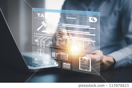 Hand using tablet with bar TAX REFUND and refund tax of duty taxation business, graphs and chart being demonstrated on the screen media, tablet pc and selecting tax refund. Hand using tablet with bar TAX REFUND and refund tax of duty taxation business, graphs and chart being demonstrated on the screen media, tablet pc and selecting tax refund. 113978823