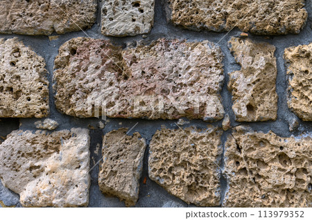 Background of ancient brick wall. Texture of old amphitheater stone. 1 113979352