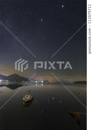 Summer starscape in Setouchi Orion rising in the sky of the fishing port Summer starscape in Setouchi Orion rising in the sky of the fishing port 113979711