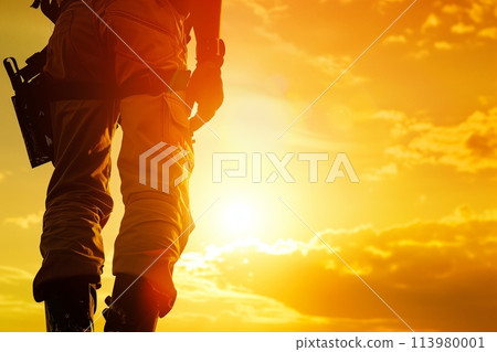 Silhouette of a worker at sunset on site Silhouette of a worker at sunset on site 113980001