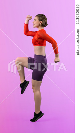 Full body length gaiety shot athletic sporty woman with running posture Full body length gaiety shot athletic sporty woman with running posture 113980056