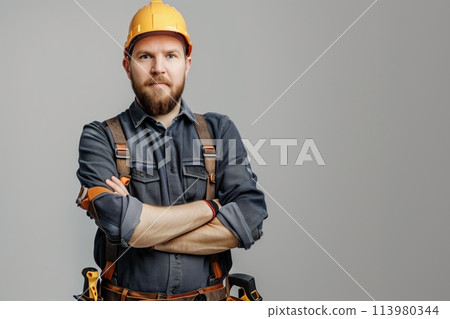 Confident construction worker standing 113980344