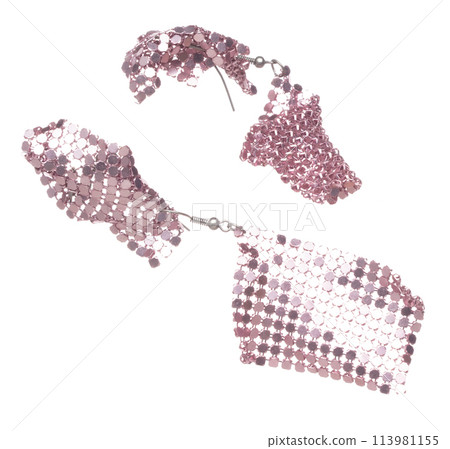 Fashion pink shinny Earrings with beautiful work detail is value. Luxury pink cloth earring is fashion trend and fly in air. White background isolated 113981155