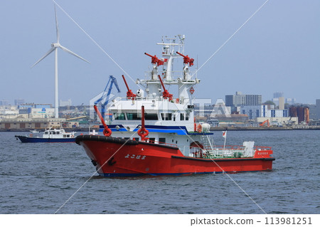 Fireboat spraying water Fireboat spraying water 113981251