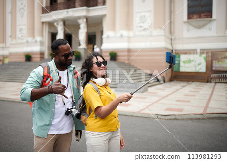 Happy young tourists taking selfie Happy young tourists taking selfie 113981293