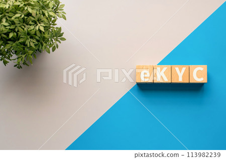 A wooden cube with the word "eKYC" written on it. Electronic Know Your Customer A wooden cube with the word "eKYC" written on it. Electronic Know Your Customer 113982239